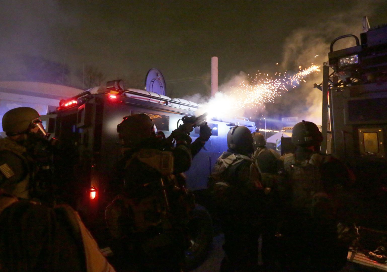 St. Louis County Police respond to crowds after grand jury announcement